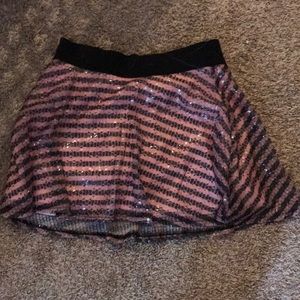 Pink and black striped skirt